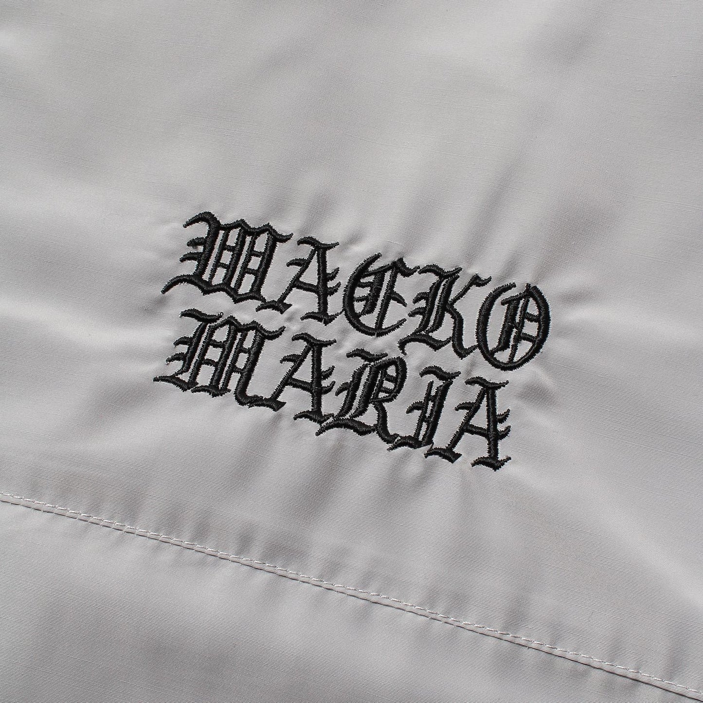 WACKO MARIA（ワコマリア）2026年春夏コレクション「天国東京」から、フットボールブランド「UMBLO（アンブロ）」とのオフィシャルコラボレーショントラックジャケット UMBRO / NYLON TRACK JACKET ( TYPE-1 ) 26SS-WMO-UB01。アップ1