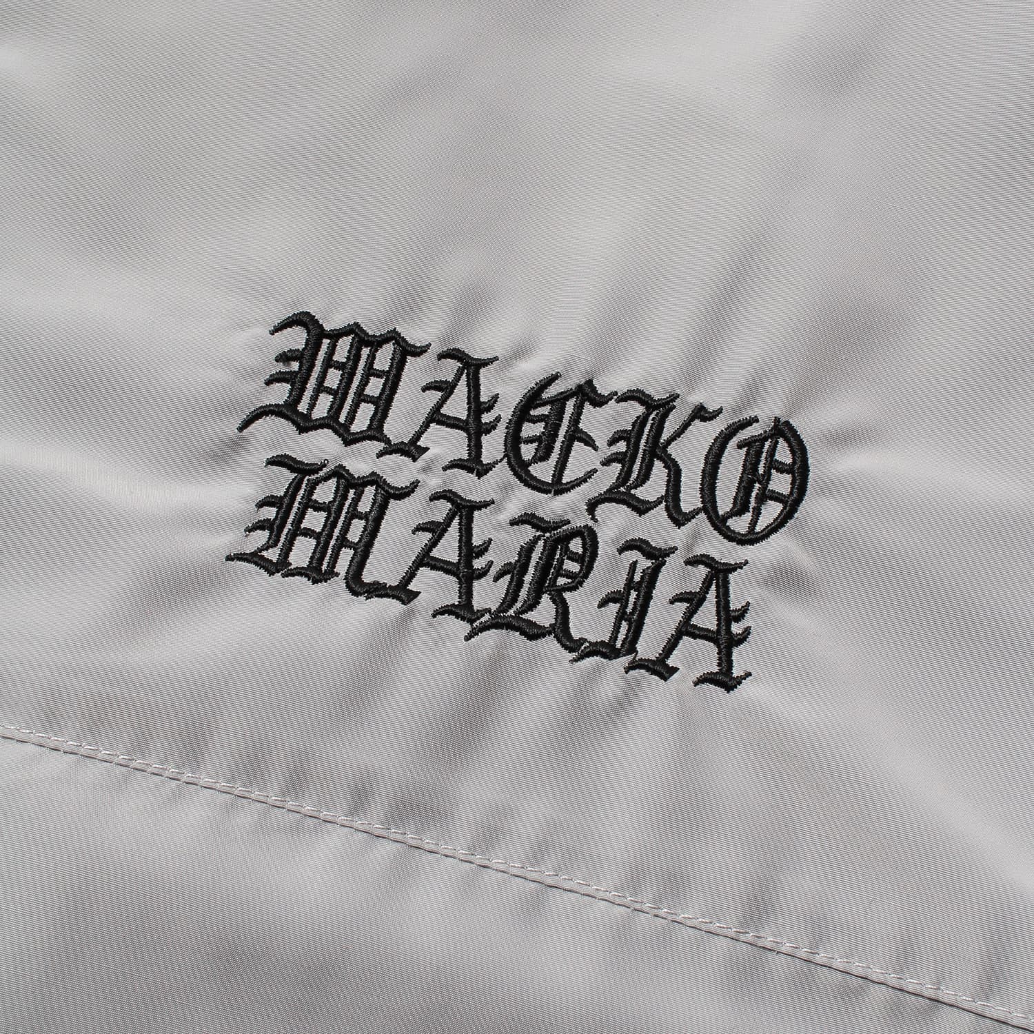 WACKO MARIA（ワコマリア）2026年春夏コレクション「天国東京」から、フットボールブランド「UMBLO（アンブロ）」とのオフィシャルコラボレーショントラックジャケット UMBRO / NYLON TRACK JACKET ( TYPE-1 ) 26SS-WMO-UB01。アップ1