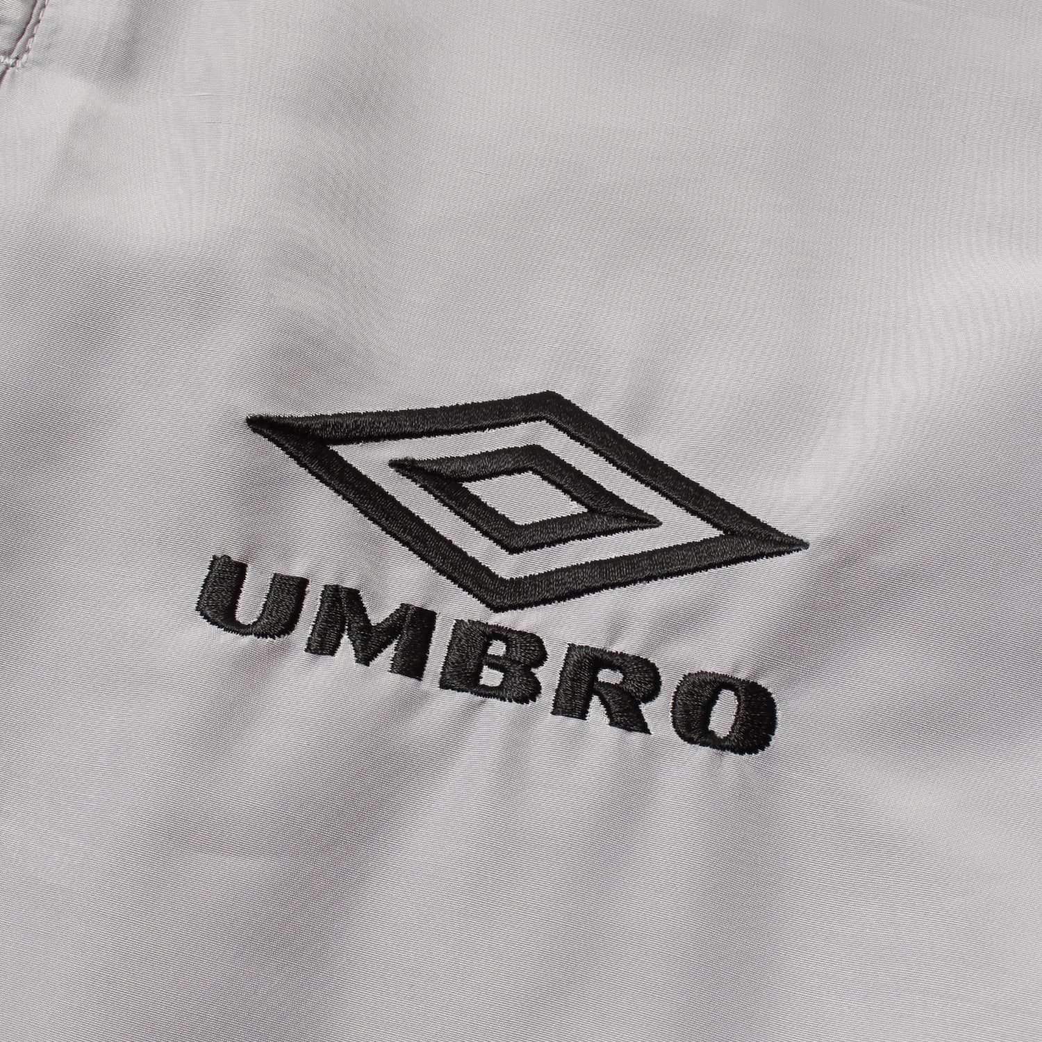 アンブロコラボ ナイロントラックパンツ (タイプ1) 26SS-WMO-UB02